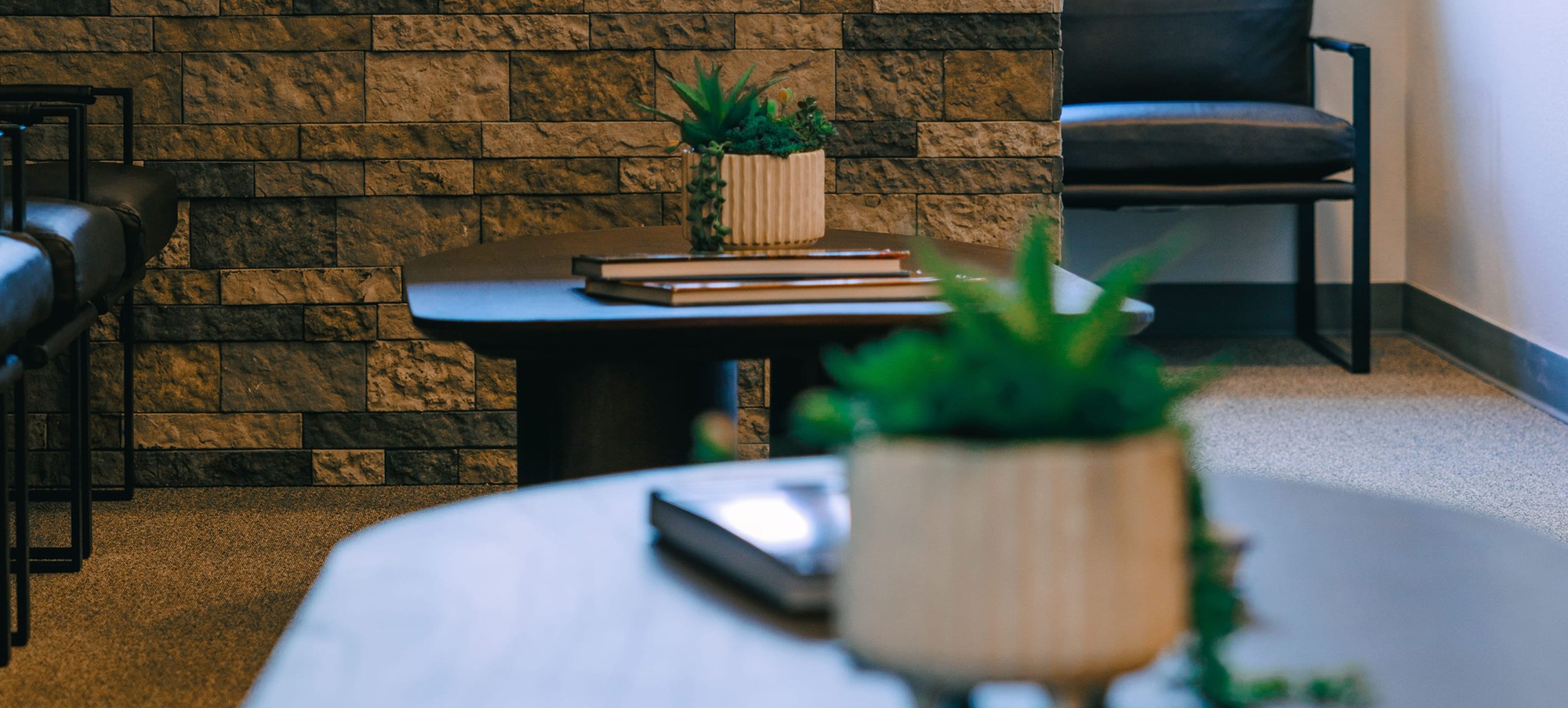 staff talking to patient with clipboard